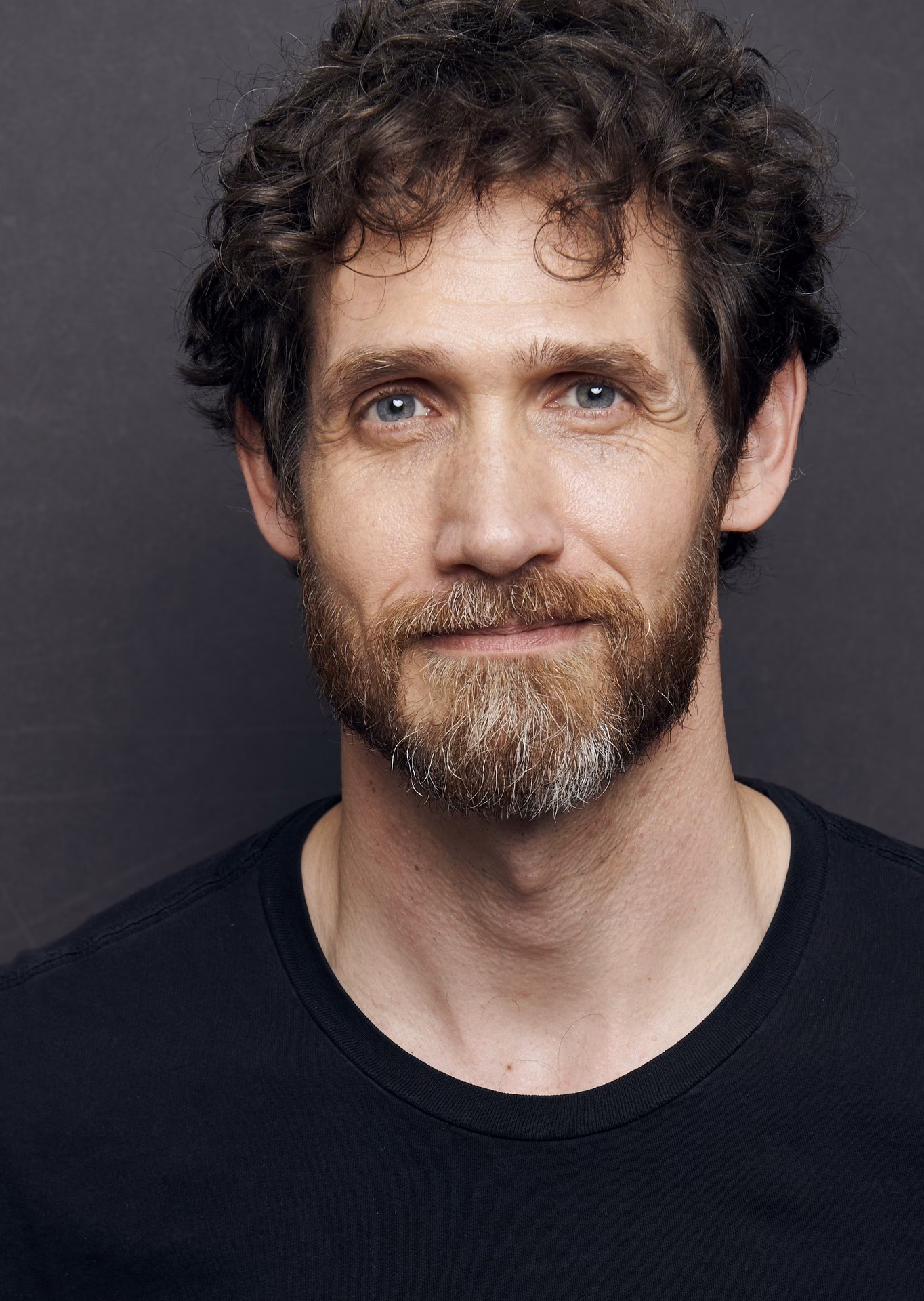 How can a free accent checker help a non-native English speaker?