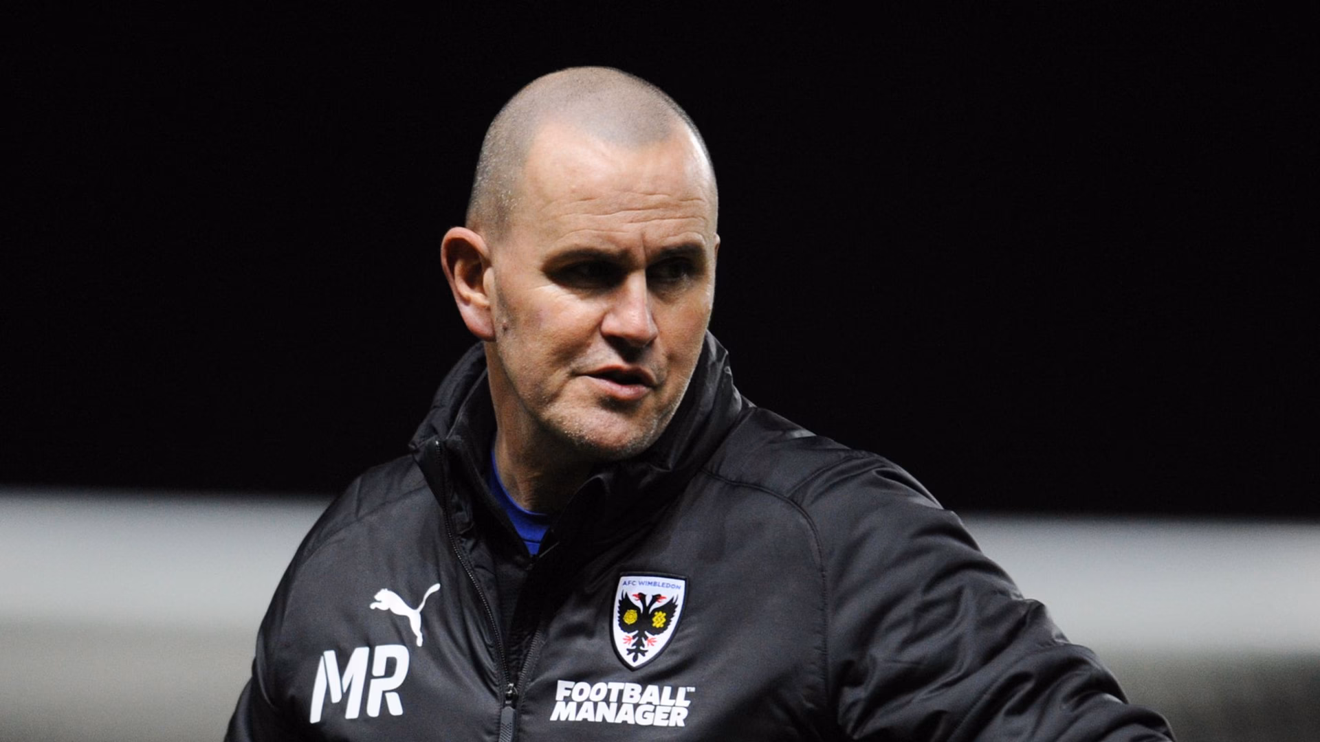 Who is AFC Wimbledon's new interim manager?