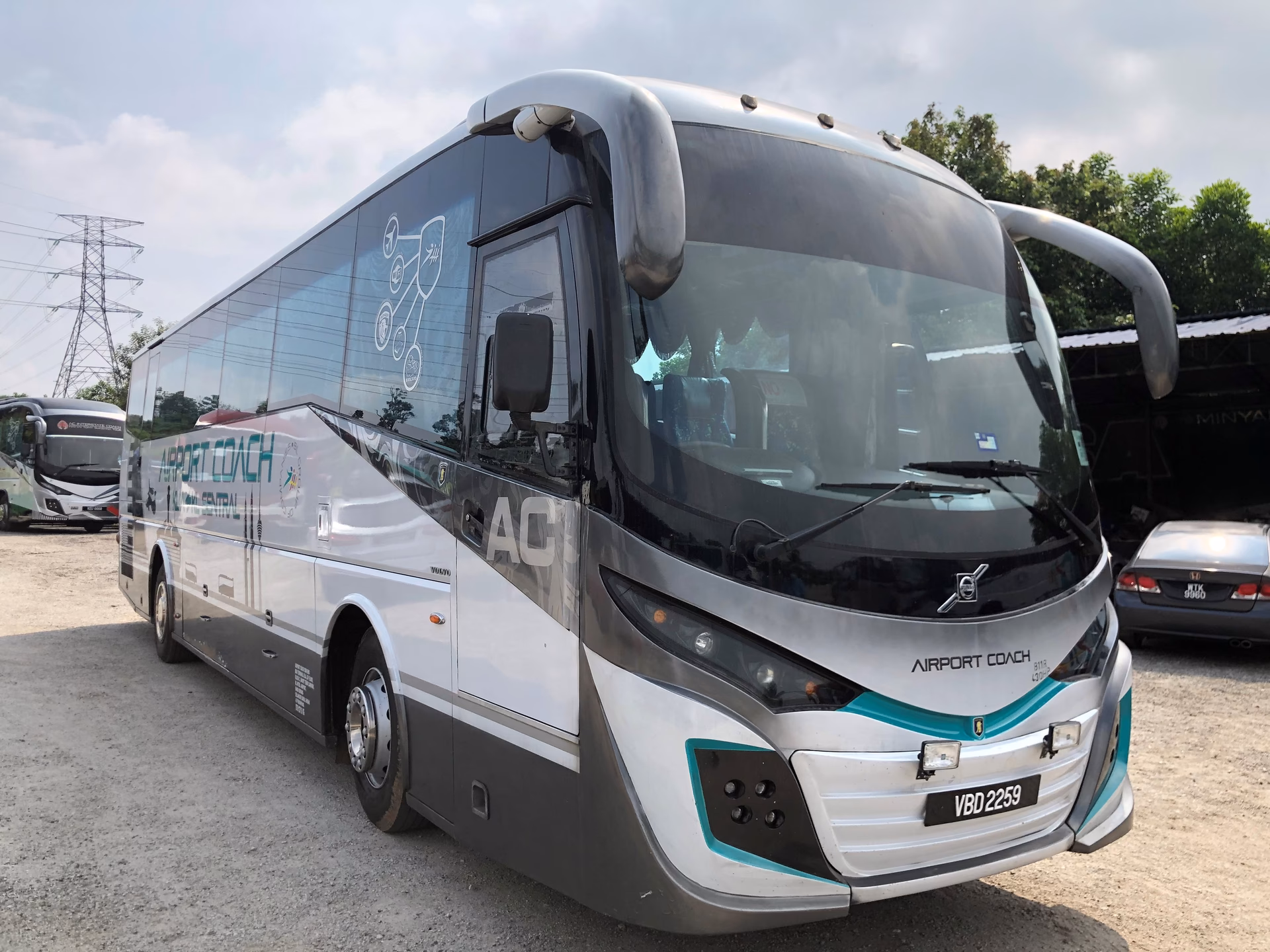 Does airport coach offer a shuttle service to Kuala Lumpur International Airport?