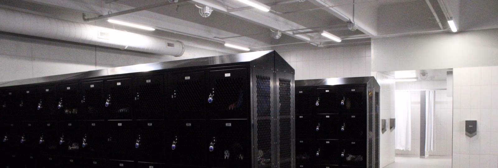 Are women allowed in male locker rooms in the UK?