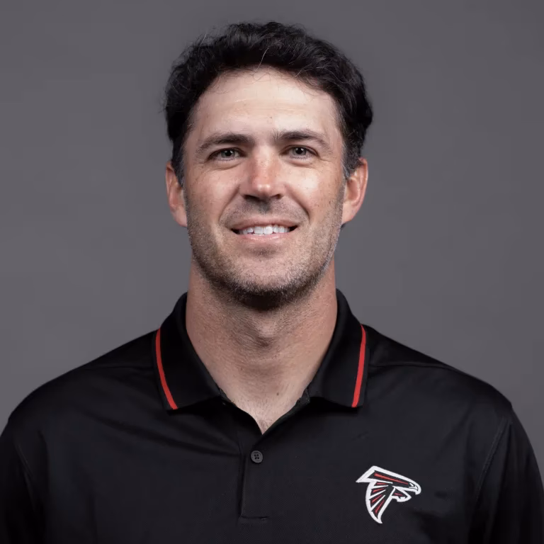 Who is Atlanta Falcons defensive line coach Nate Ollie?