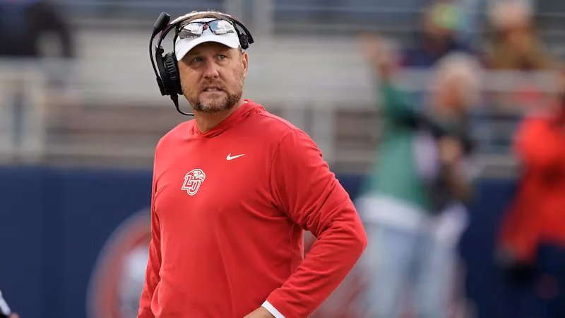 Who has coached the most games in Auburn history?