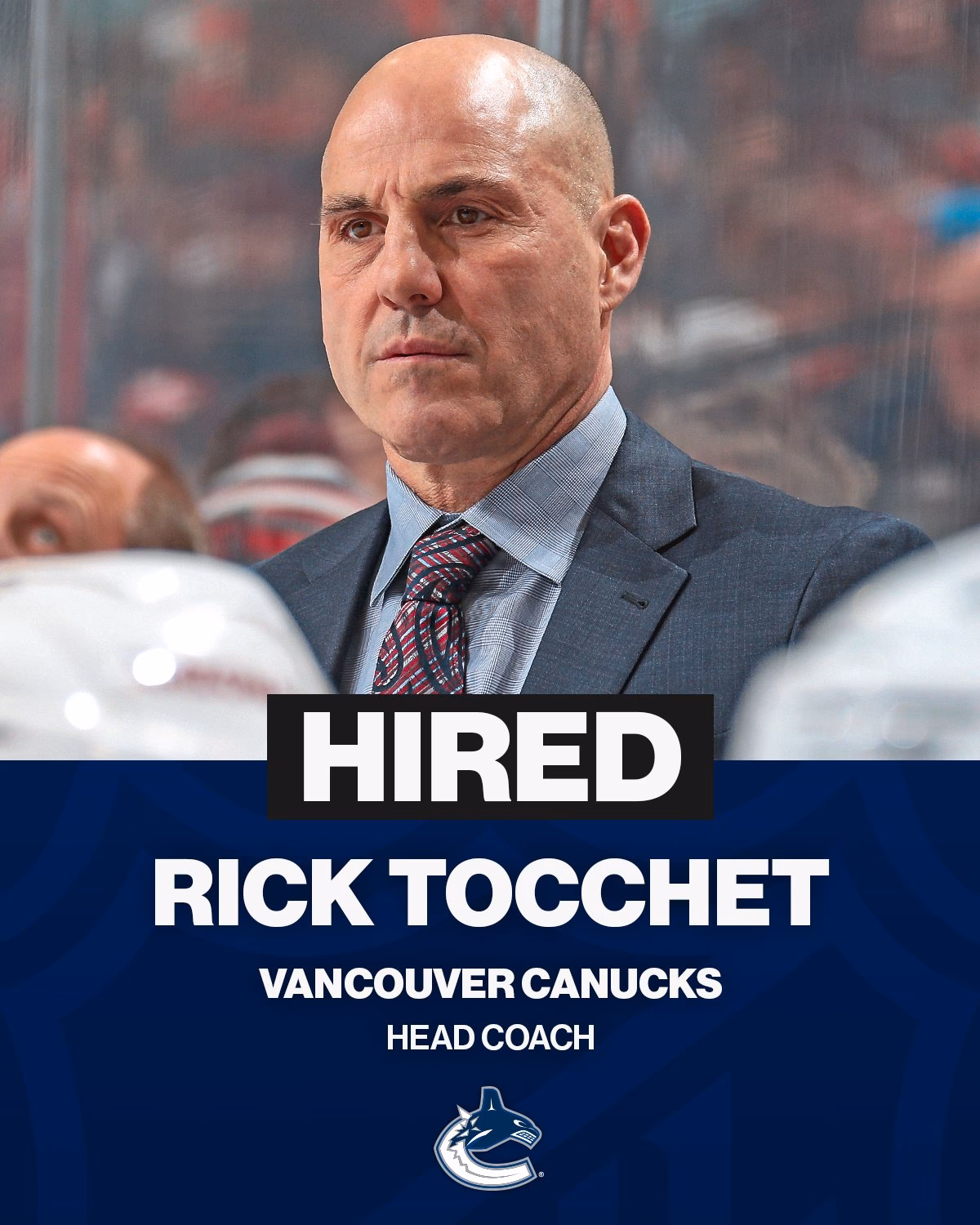 Who is Vancouver Canucks head coach Adam Foote?