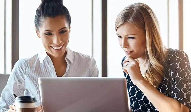 Why might women need a career coach?