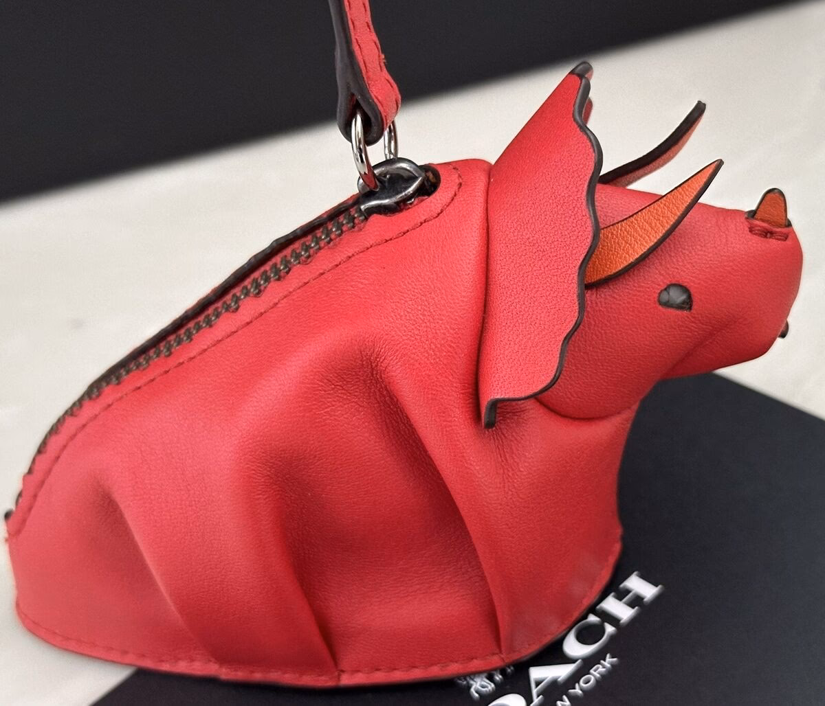 What is a Dino coin purse?