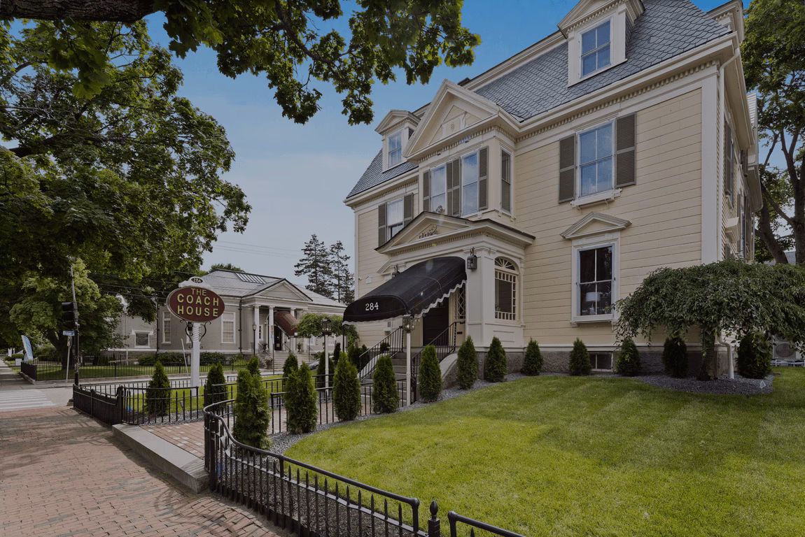 Why should you stay at Coach House Hotel?