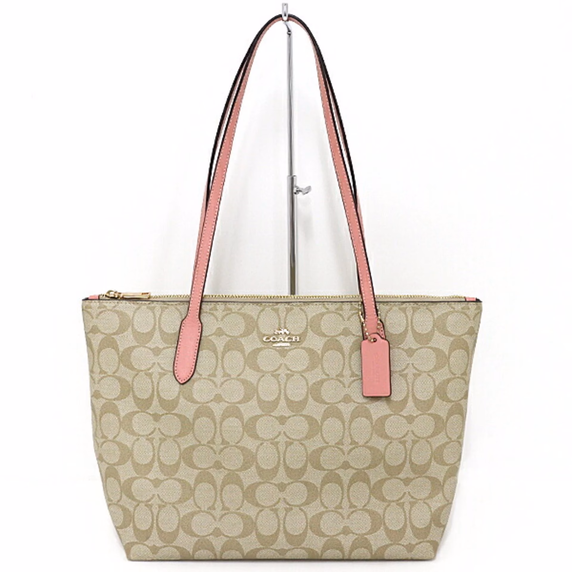 Does coach sell pink handbags?