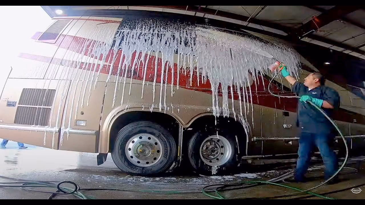 How many coaches a day need a brush wash machine?