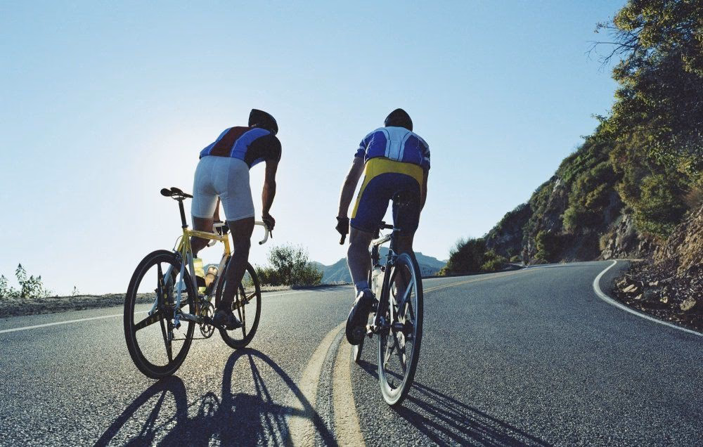What does a cycling coach do?