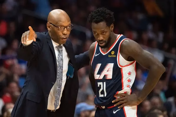 Who is the head coach of men's basketball?