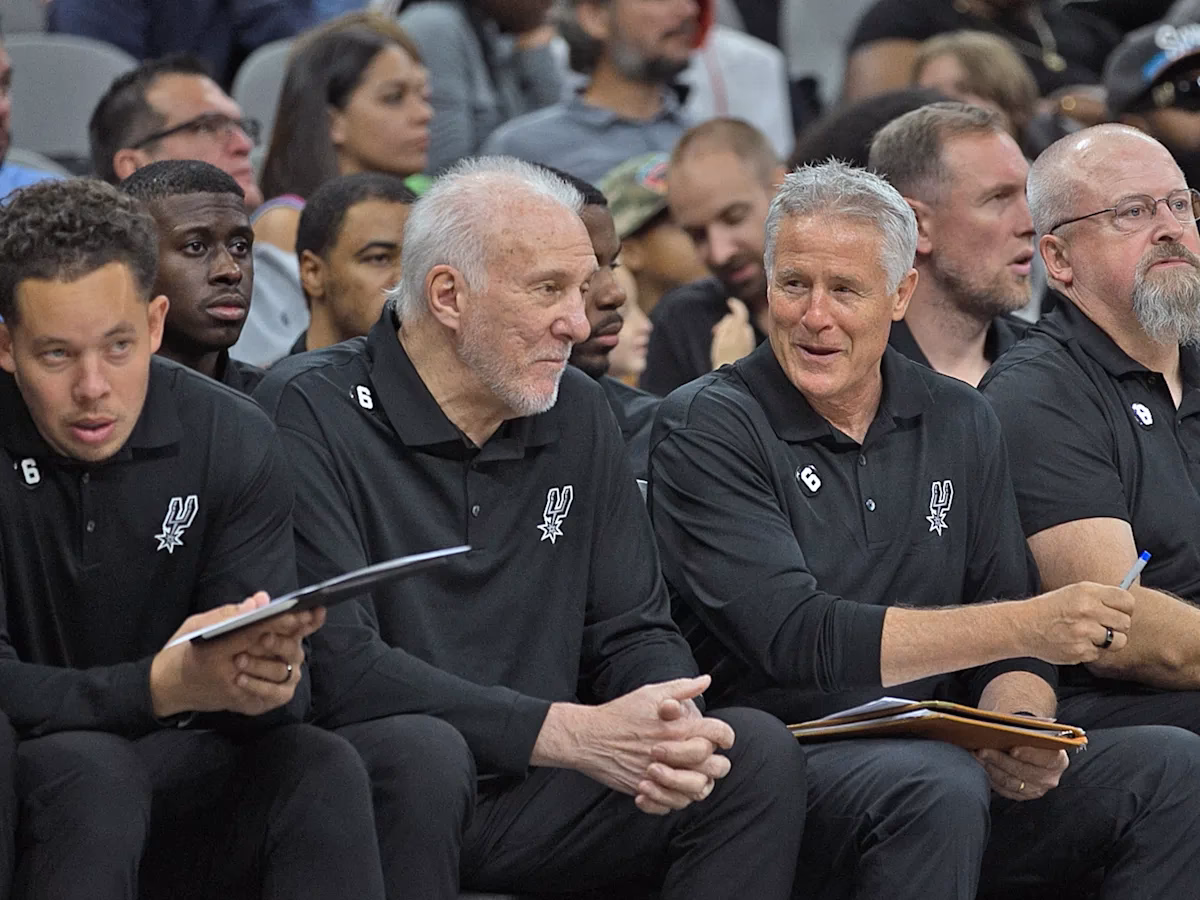 What kind of experience does a Spurs coach have?