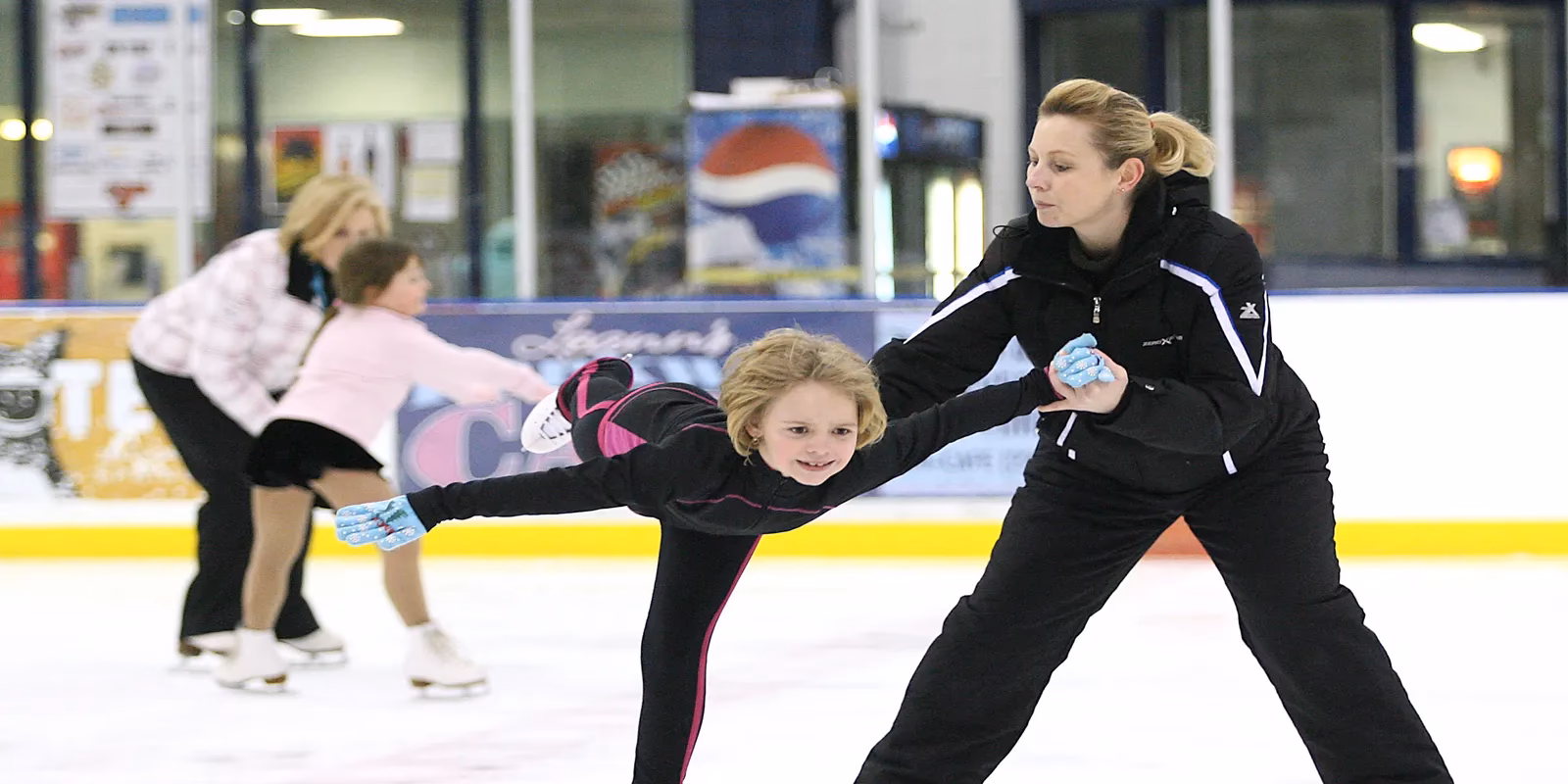 What does a figure skating coach do?