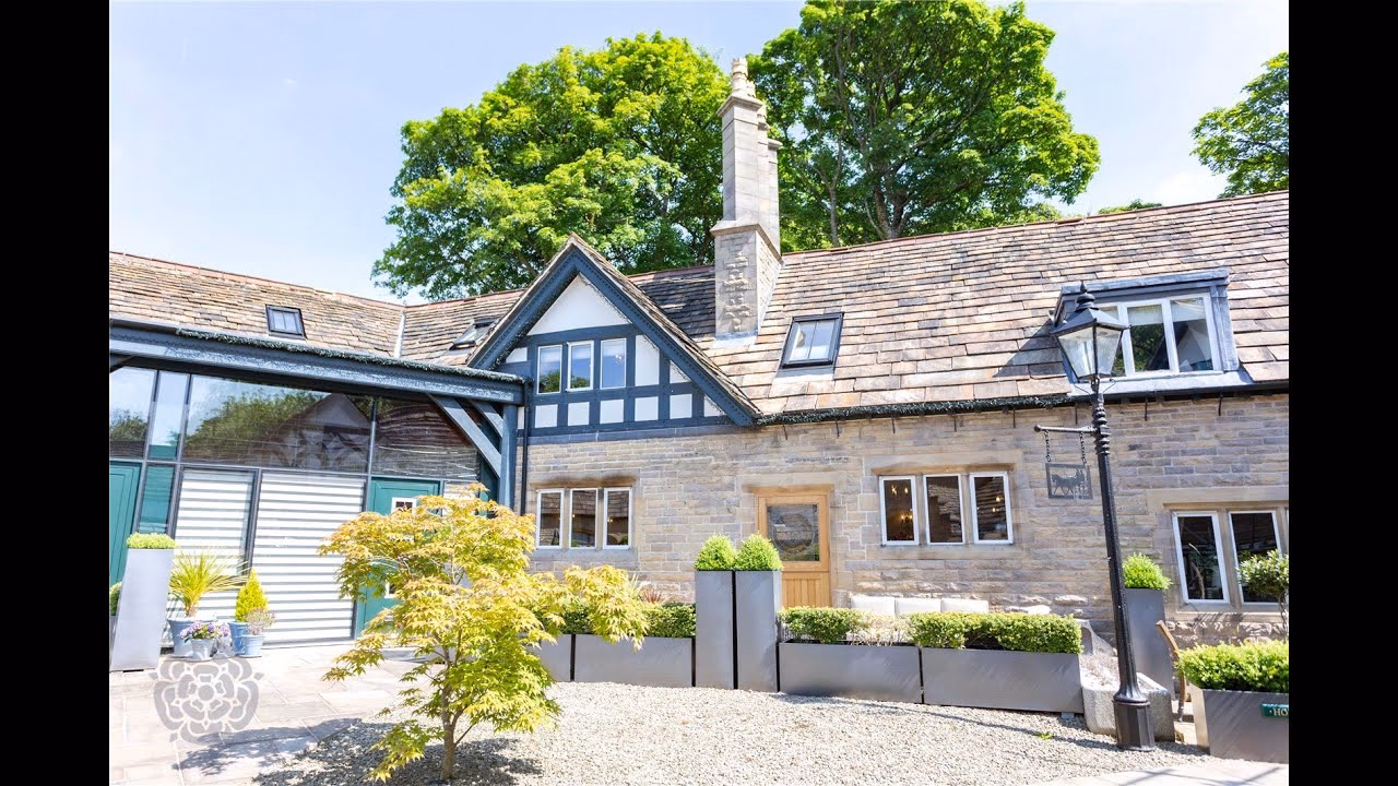 Are all nine high-end homes at Smithills Coaching House sold?